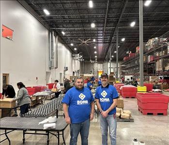 SERVPRO® employees with blue BOMA shirts on