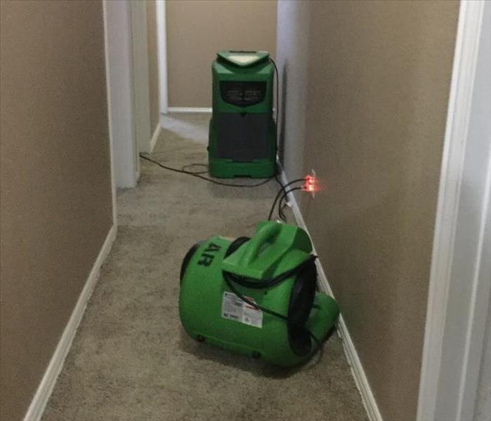 SERVPRO equipment in a hallway