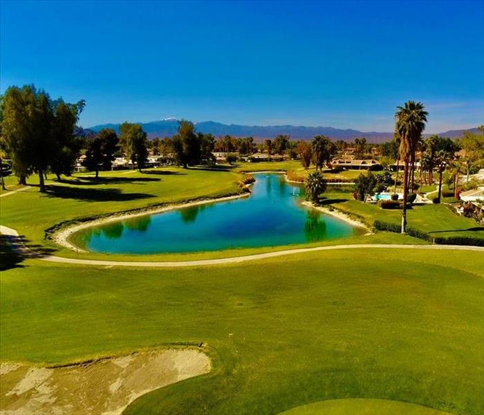 Golf hole with pond